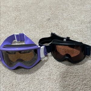 Purple and Black snowboarding goggles